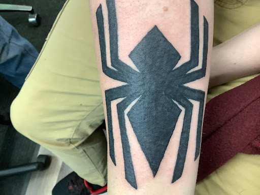 Explore flower bouquet tattoo ideas, creative tattoo ideas in Bradley, available at Rogers Tattooing & Body Piercing