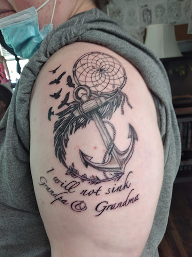 Explore phoenix tattoo ideas men, creative tattoo ideas in Kewanee, available at Splat Ink tattoos and piercings