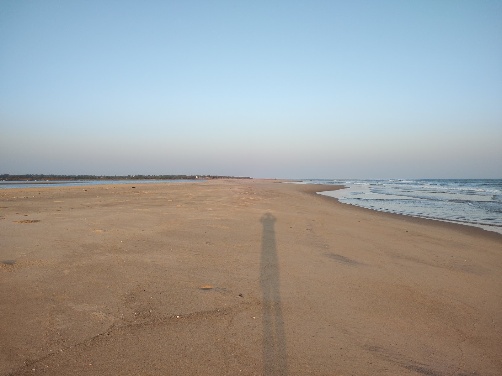 Foto de PD Palem Beach com areia brilhante superfície