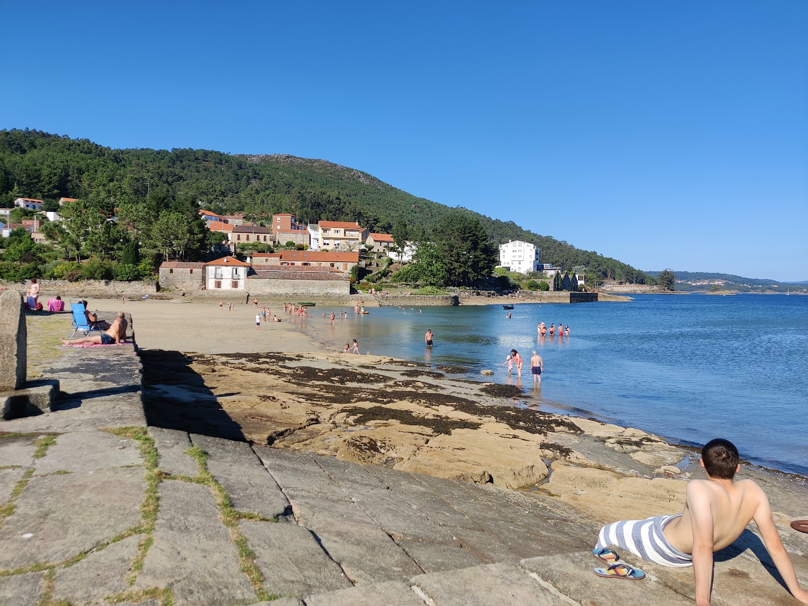 Foto di Praia de Anido con una superficie del sabbia beige