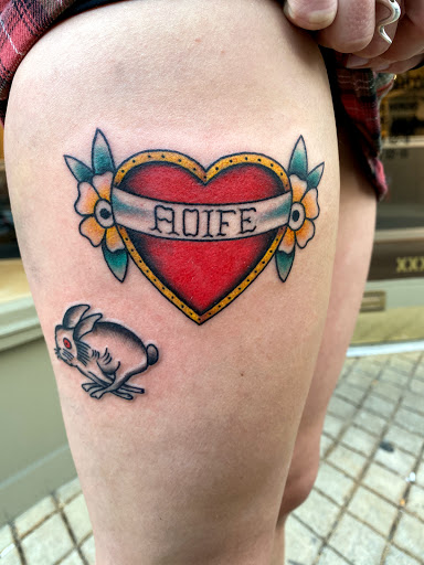 Explore smile tattoo ideas, creative tattoo ideas in Charlottesville, available at Have Heart Tattoo