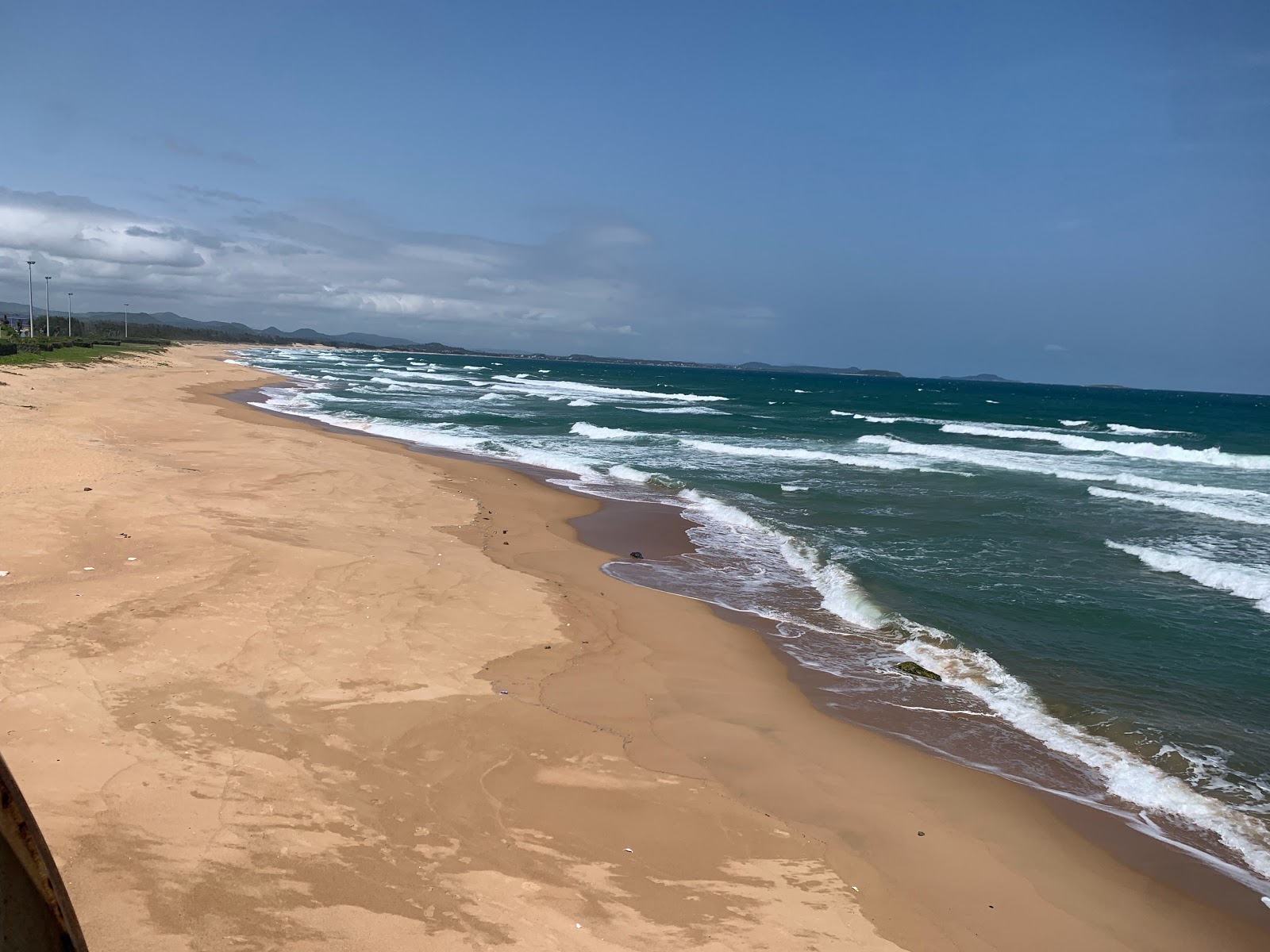 Fotografija Tower of the Wind Beach z svetel fin pesek površino