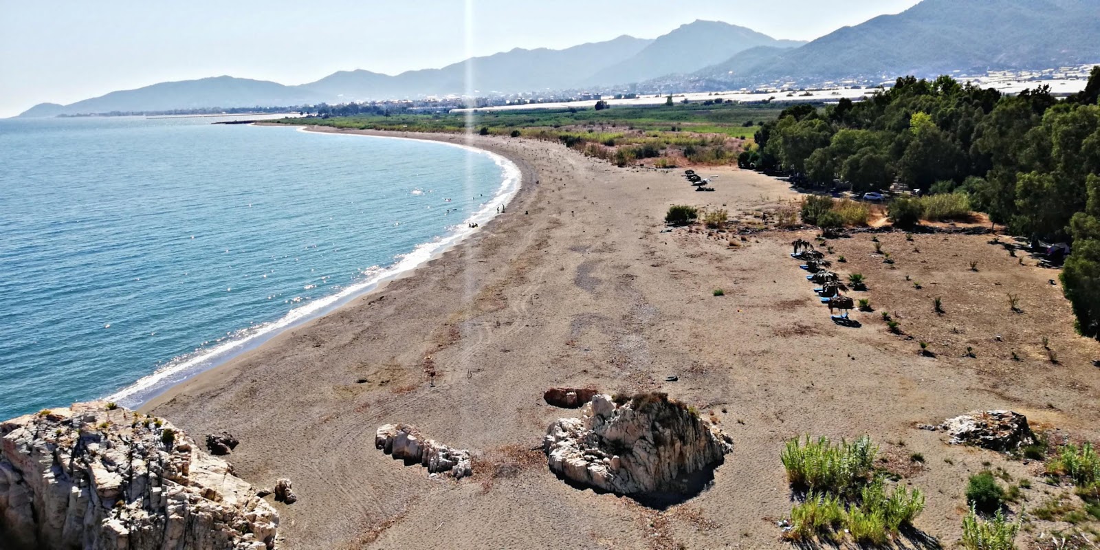 Foto di Kocadut beach con una superficie del acqua verde-blu