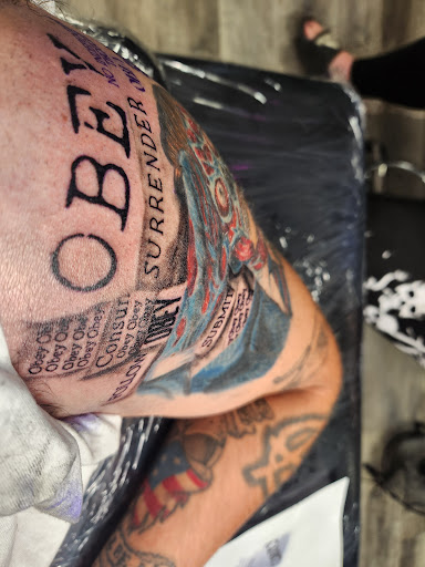Explore travis scott tattoo idea, creative tattoo ideas in Grand Island, available at Tattoos by Dopes