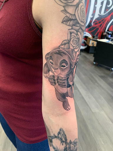 Explore guitar pick tattoo ideas, creative tattoo ideas in Silver City, available at Independent Ink Tattoo