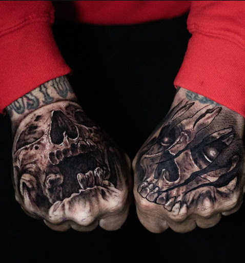 Explore parrot tattoo ideas, creative tattoo ideas in Arlington, available at Benchmark Tattoos