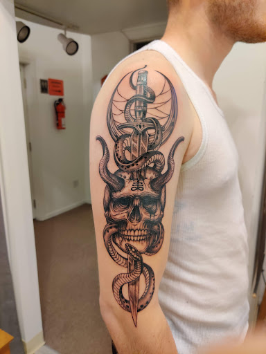 Explore twilight zone tattoo ideas, creative tattoo ideas in Hebron, available at Explosive Ink Tattoo