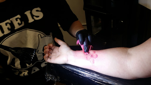 Find tattoo necklace ideas for your next unique tattoo in North Conway at The Darling Grey Tattoo,Gallery & Piercing