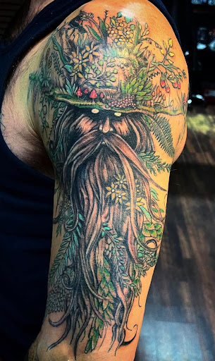 Explore archery tattoo ideas, creative tattoo ideas in Grand Island, available at The Shaded Dahlia Piercing & Tattoo Parlor