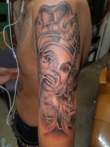 Explore full neck tattoo ideas for men, creative tattoo ideas in Odessa, available at Little Dragon Tattoos Studio