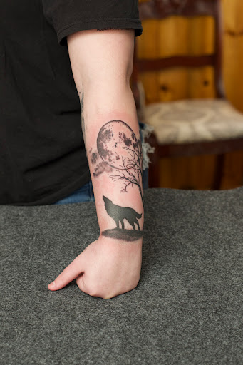 Explore mens cross tattoo ideas, creative tattoo ideas in Moweaqua, available at Fleshwound Tattoo