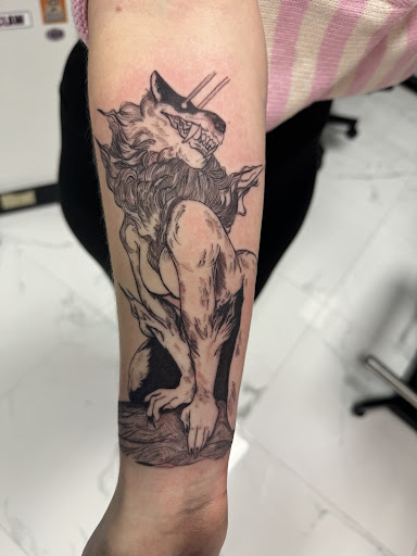 Explore flower leg tattoo ideas, creative tattoo ideas in Youngsville, available at Inkophilia