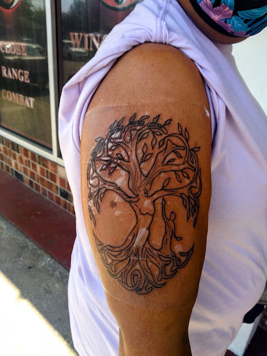 Explore simple neck tattoo ideas, creative tattoo ideas in Tacoma, available at Garfield Street Tattoo Co