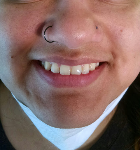 Explore postage stamp tattoo ideas, creative tattoo ideas in Hanceville, available at Wildman Tattoo and Body Piercing