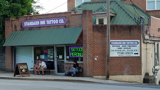 Explore tribal lion tattoo ideas, creative tattoo ideas in Chattanooga, available at Standard Ink Tattoo Co