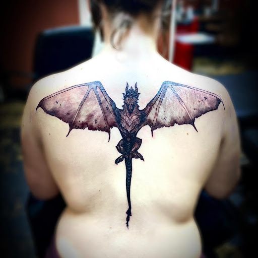 Explore stomach tattoo ideas for men, creative tattoo ideas in Pineville, available at Epic Ink Studio