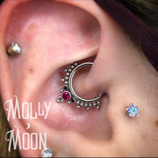 Explore rose tattoo ideas for women, creative tattoo ideas in Oshkosh, available at Piercings by Molly Moon at 920 Tattoo and Piercing