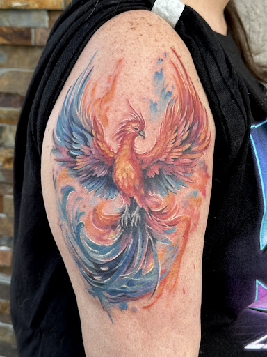 Explore men's back tattoos ideas, creative tattoo ideas in Spring Hill, available at Ever After Gallery