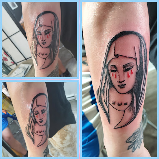 Explore dolphin tattoo ideas, creative tattoo ideas in Bloomsburg, available at Tuccis Tattoo & Piercings Studio