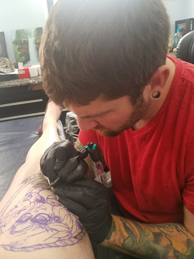Find best tattoo ideas for guys for your next unique tattoo in Springfield at Anchored Ink Tattoo & Piercing by SPLAT LLC