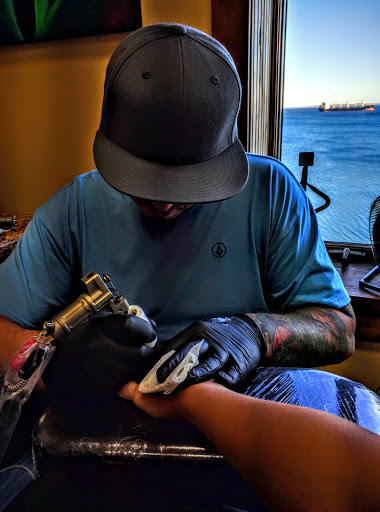 Explore crossword tattoo ideas, creative tattoo ideas in Duluth, available at The Living Art Studio