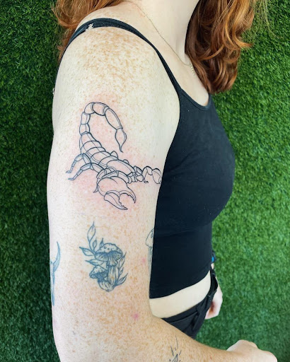 Find small tree tattoo ideas for your next unique tattoo in Cocoa at Rorschach Tattoo Shop and Piercing Studio