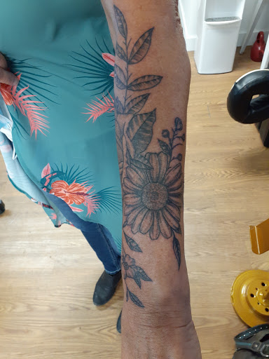 Explore atlanta falcons tattoo ideas, creative tattoo ideas in Putnam, available at Red Spider Tattoo