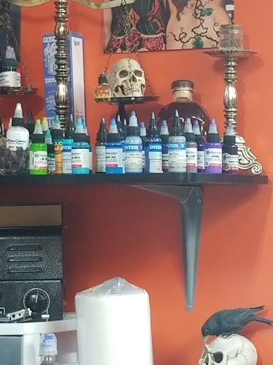 Explore woman side tattoo ideas, creative tattoo ideas in Warren, available at Fat Cats Tattoos