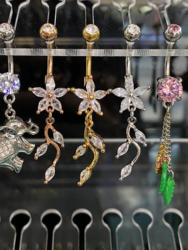 Find web tattoo ideas for your next unique tattoo in Oswego at Bodified