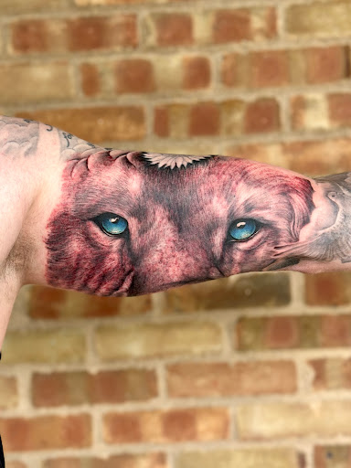 Explore tattoo ideas black male, creative tattoo ideas in Powell, available at Elysium Body Enhancements