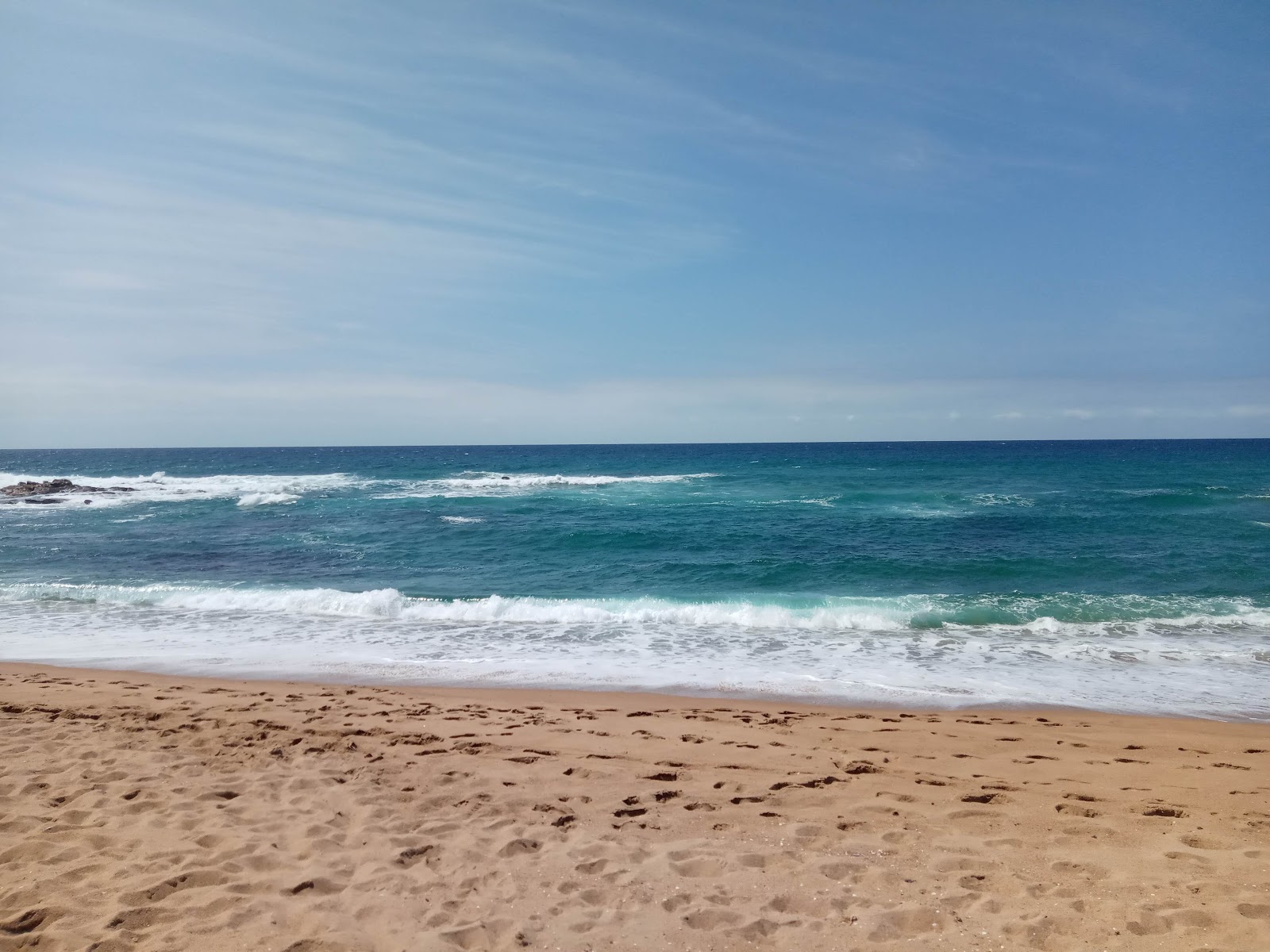Photo de Pumela beach avec l'eau cristalline de surface