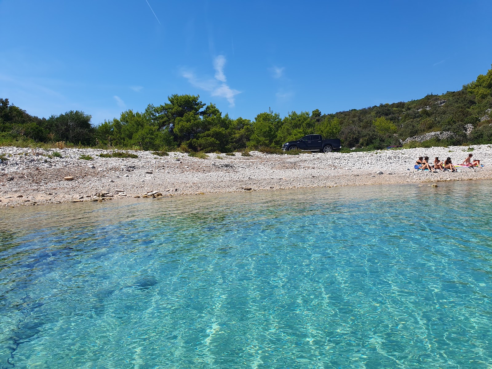 Solinska Beach'in fotoğrafı düz bir kıyı şeridi ile birlikte