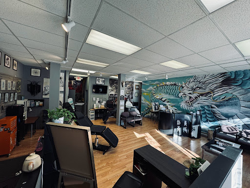 Explore hand tattoo ideas man, creative tattoo ideas in Menomonie, available at Blue Dragon Tattoo