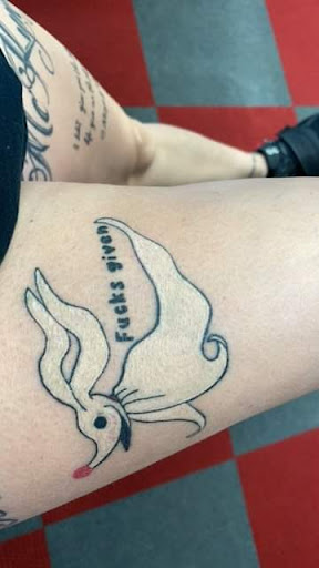 Explore simple one piece tattoo ideas, creative tattoo ideas in Benton, available at Spectrum Tattoo