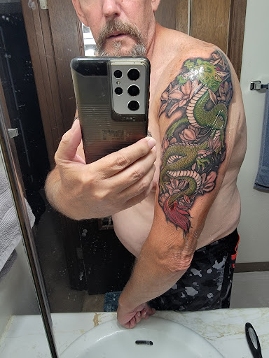 Explore dog tag tattoo ideas, creative tattoo ideas in Topeka, available at Absolute Tattoo