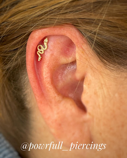 Explore neck tattoos for women ideas, creative tattoo ideas in Louisville, available at Inksmith Tattoo and Piercing