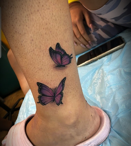 Explore rose tattoo ideas for women, creative tattoo ideas in Abington, available at Ink Boss Tattoo & Piercing Studio