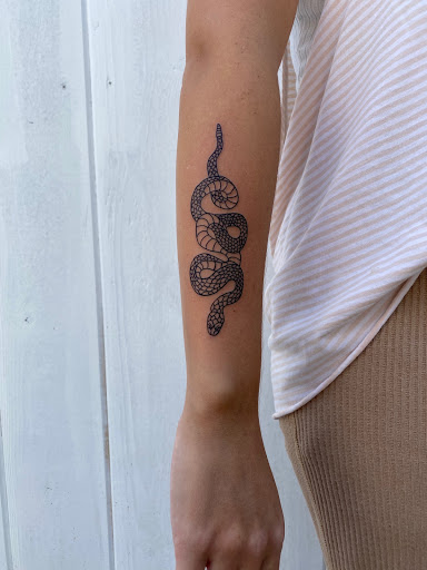 Explore tattoo name cover up ideas on wrist, creative tattoo ideas in Los Angeles, available at Supersweet Tattoos and Coffee