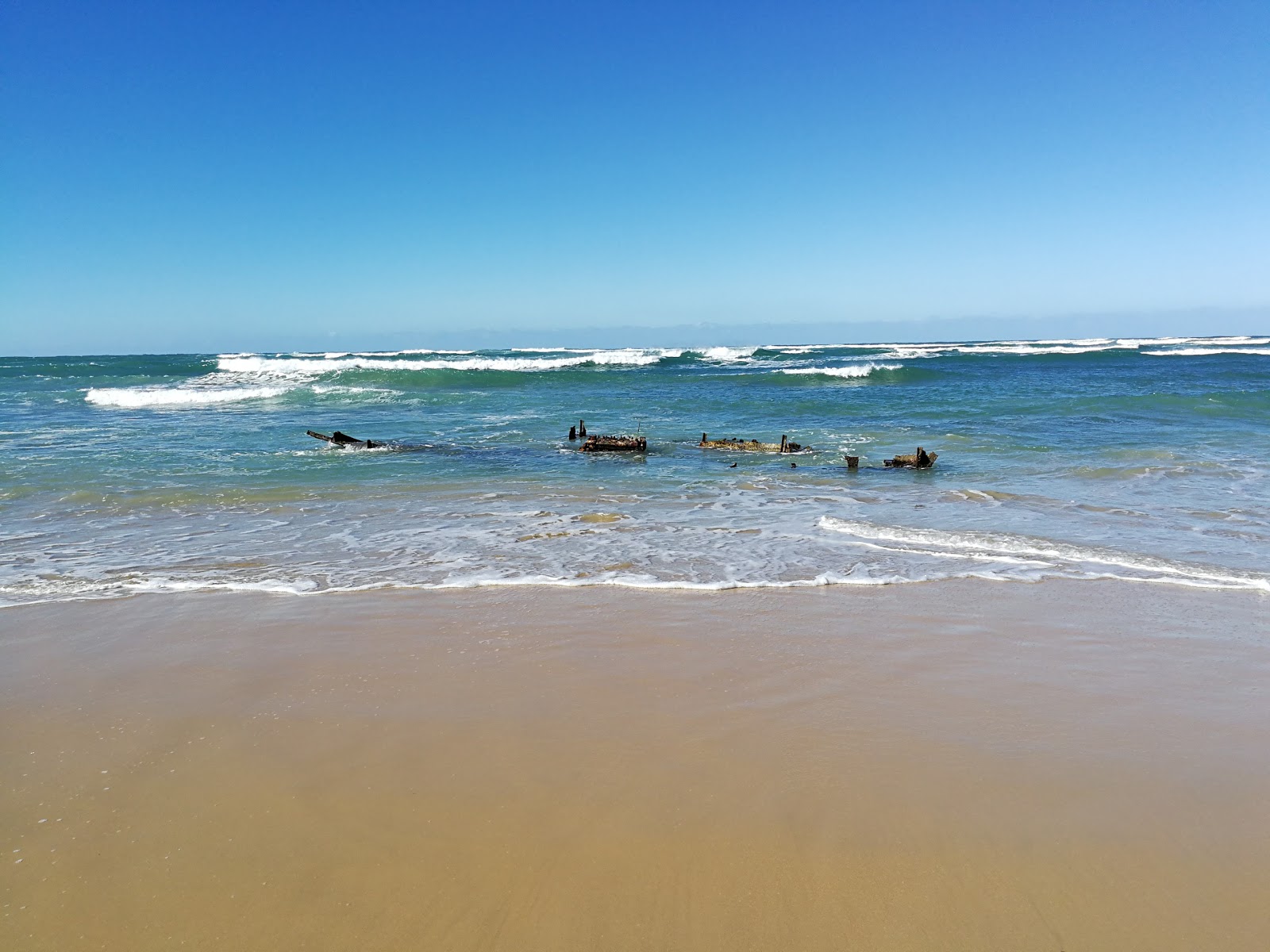 Photo de East beach avec rivage droit, long