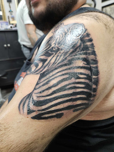 Explore name tattoo ideas small, creative tattoo ideas in Fall River, available at Up In Flames Tattoo