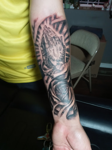 Explore filmmaker tattoo ideas, creative tattoo ideas in Seattle, available at Good Times Tattoo