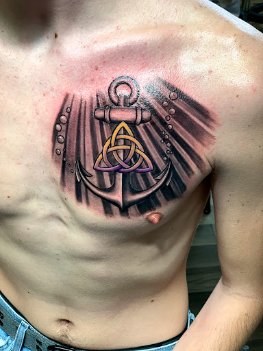 Find dragon tattoo ideas for men for your next unique tattoo in Youngstown at Twisted Metal Custom Body Art