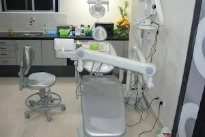 Dr Kalamkar's welldent family dental care image