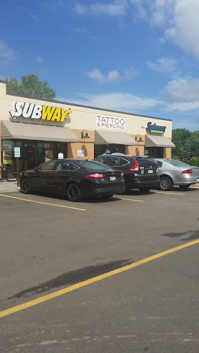 Explore neck tattoo ideas for females, creative tattoo ideas in Saint Paul, available at Aloha Art Collective Tattoo