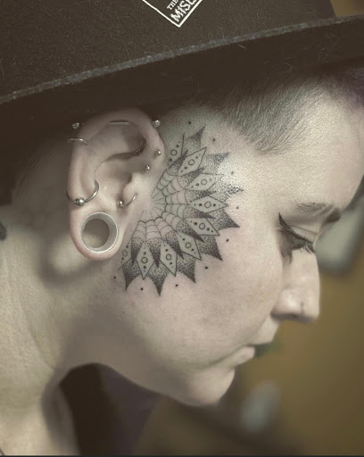 Explore rubber ducky tattoo ideas, creative tattoo ideas in Stevens Point, available at Black Rabbit Tattooing