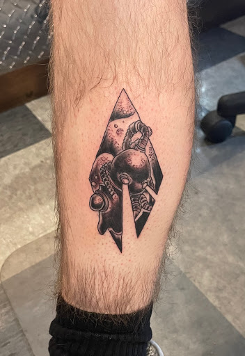 Explore lucky penny tattoo ideas, creative tattoo ideas in Old Orchard Beach, available at Mad Hatters Tattoo Studio