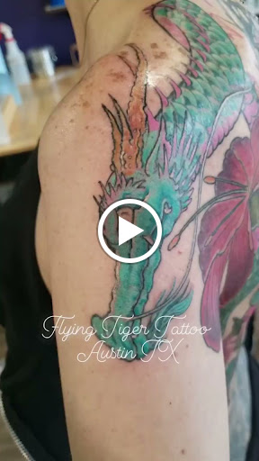 Explore female wonder woman tattoo ideas, creative tattoo ideas in Austin, available at Flying Tiger Tattoo