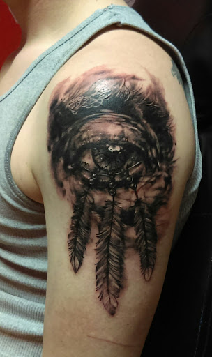 Explore hand tattoo ideas for woman, creative tattoo ideas in San Antonio, available at Dandyland Custom Tattoo and Professional Body Piercing