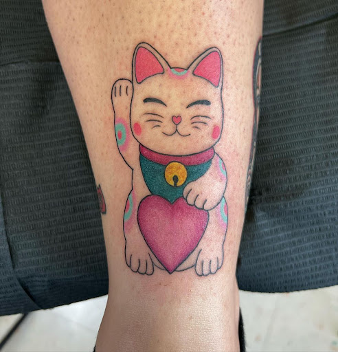 Find tattoo armband ideas for your next unique tattoo in Orange at Top Floor Tattoo Studio