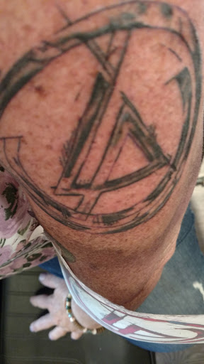 Explore tattoo ideas for breast cancer ribbon, creative tattoo ideas in Coquille, available at Inspired Ink Tattoo Shop